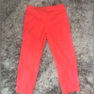 neon orange Sweaty Betty capri leggings, size S